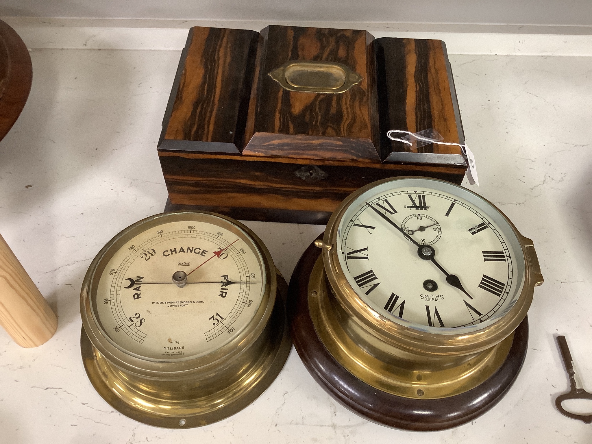 A Victorian calamander veneered humidor / three divisional caddy together with a small barometer and bulkhead clock (3), humidor 31cms wide